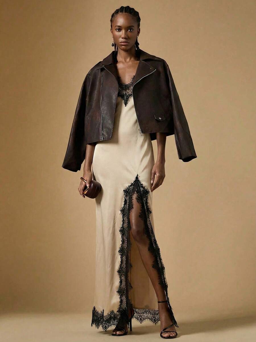 Women's black lace split satin long dress featuring spaghetti straps, asymmetrical slit hem, and matching arm sleeves.