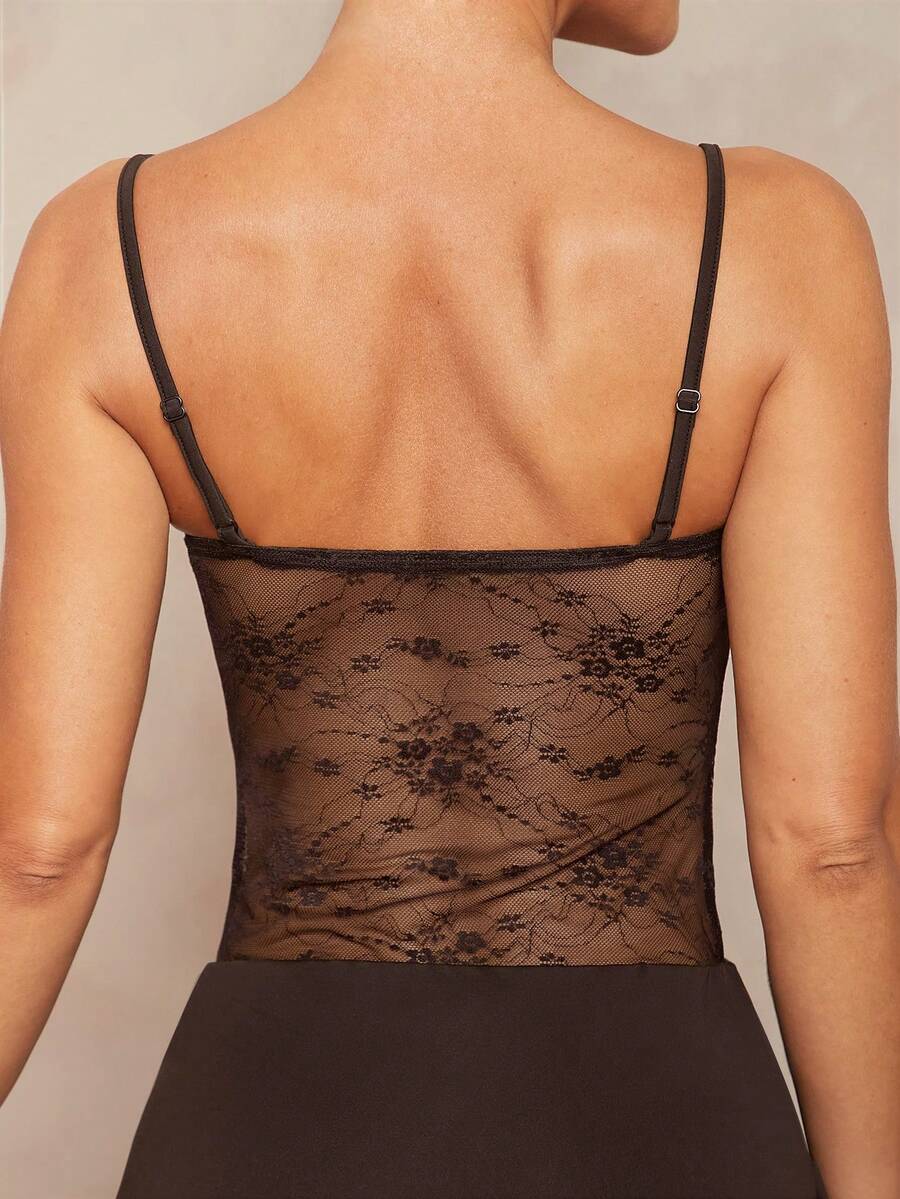 Women's black backless lace bodycon maxi dress with spaghetti straps and a mermaid hemline.