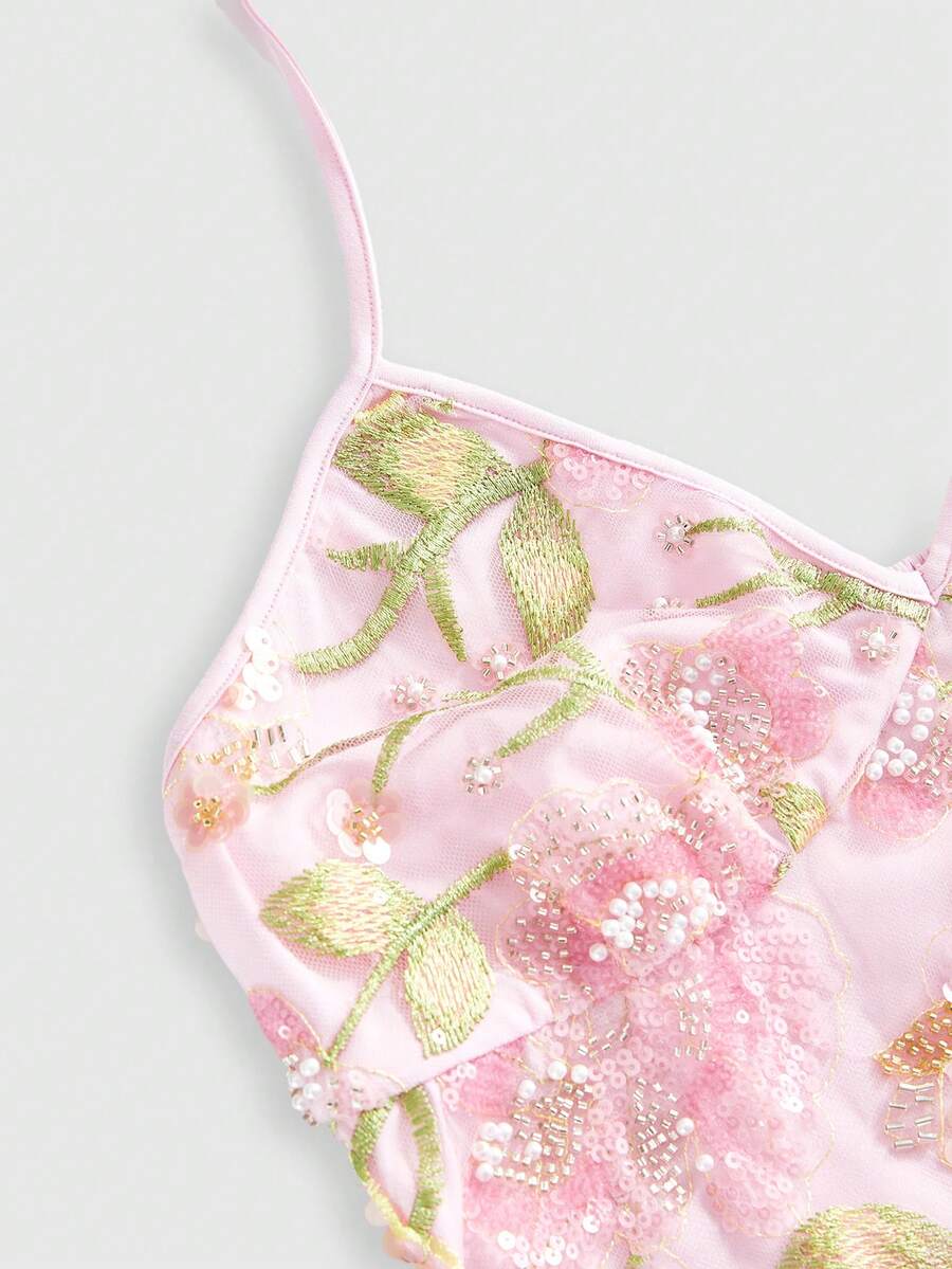 Women's floral embroidery backless halter crop top featuring contrast lace, ruched detailing, and slim fit in knitted pink fabric.