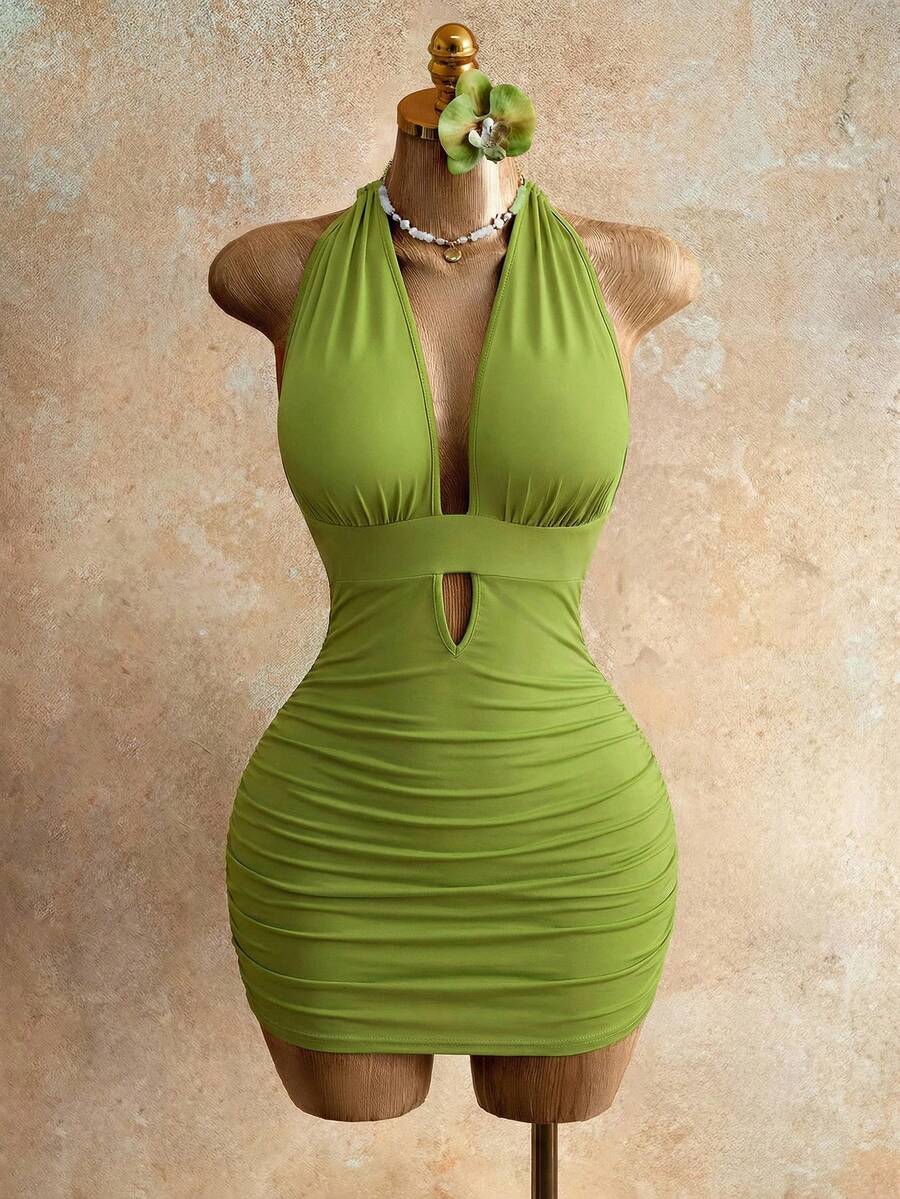 Sleeveless women's halter backless bodycon mini dress featuring lace-up knot back details and a high-waist pencil hem.
