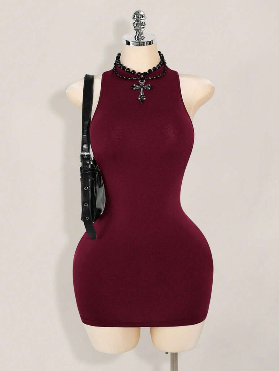 Apricot criss-cross backless bodycon mini dress for women featuring a round neck and rhinestone accent details.