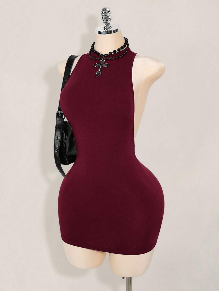 Apricot criss-cross backless bodycon mini dress for women featuring a round neck and rhinestone accent details.