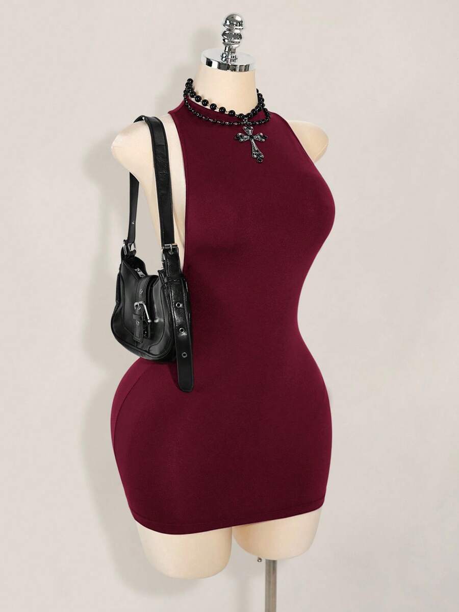 Apricot criss-cross backless bodycon mini dress for women featuring a round neck and rhinestone accent details.