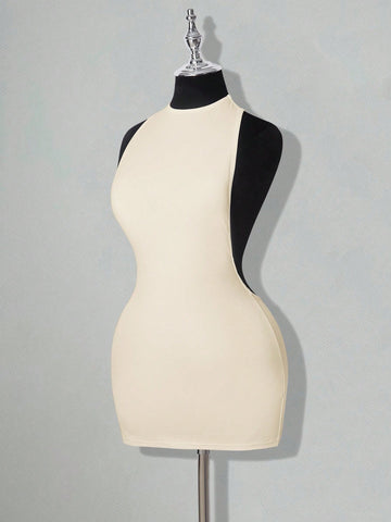 Apricot criss-cross backless bodycon mini dress for women featuring a round neck and rhinestone accent details.