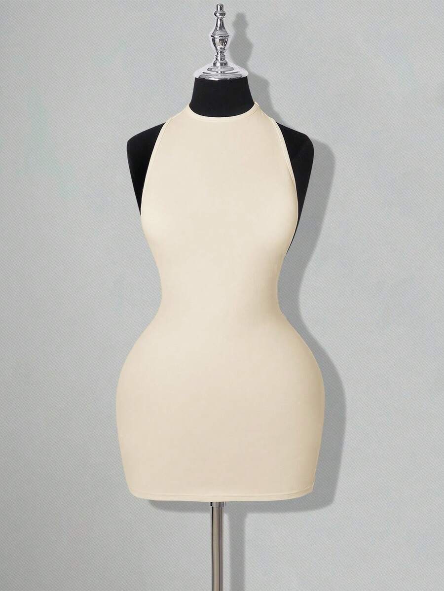 Apricot criss-cross backless bodycon mini dress for women featuring a round neck and rhinestone accent details.