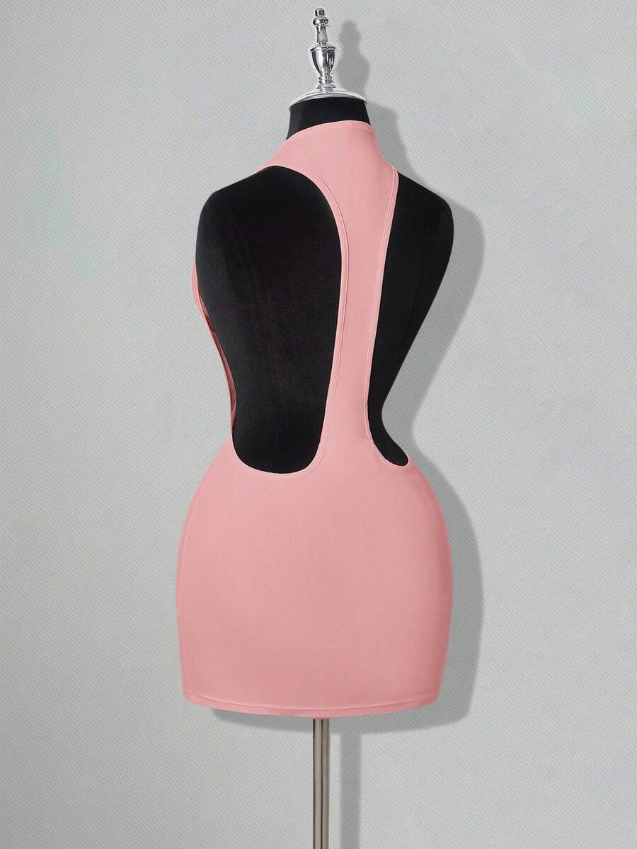 Apricot criss-cross backless bodycon mini dress for women featuring a round neck and rhinestone accent details.