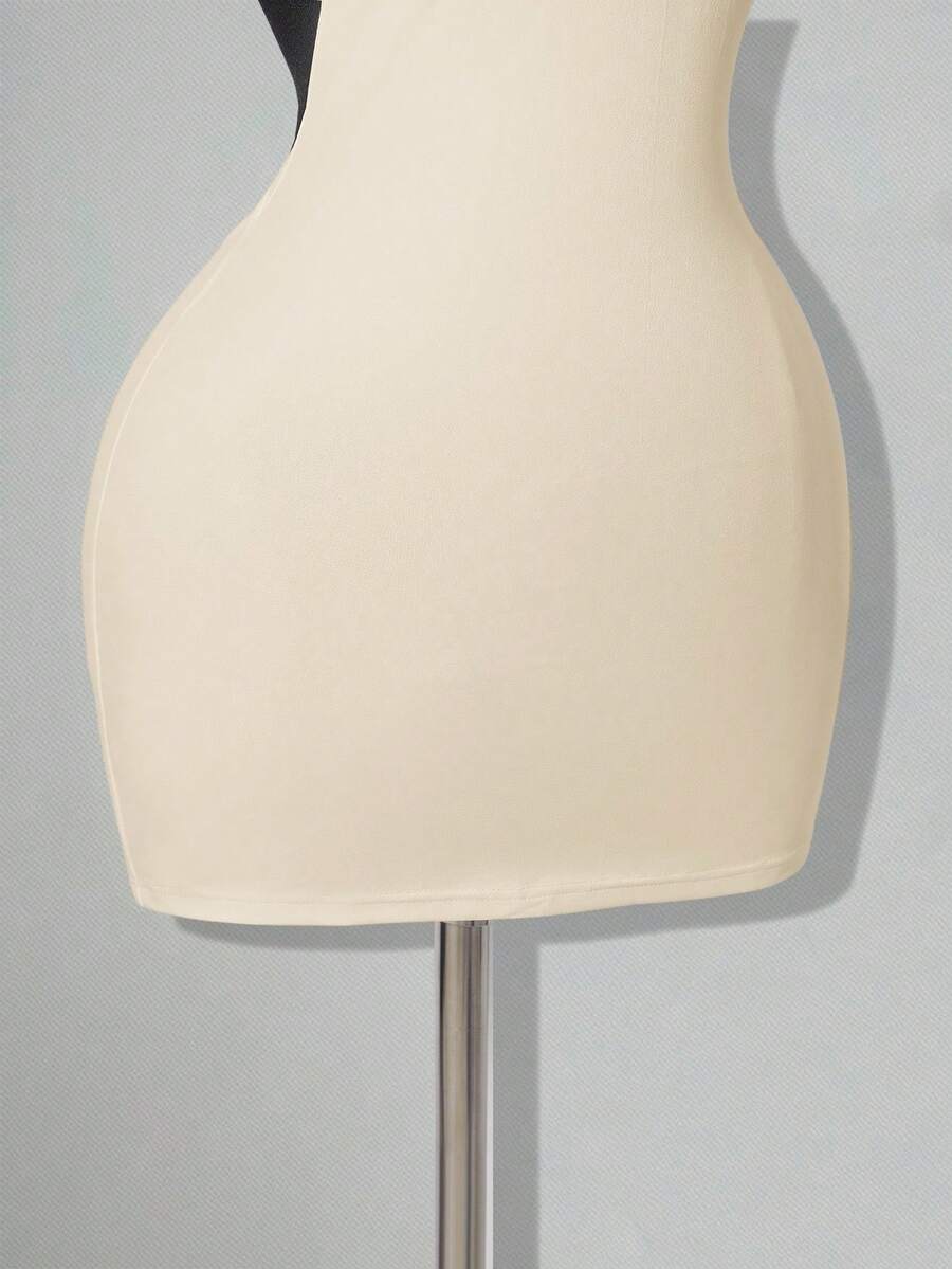 Apricot criss-cross backless bodycon mini dress for women featuring a round neck and rhinestone accent details.