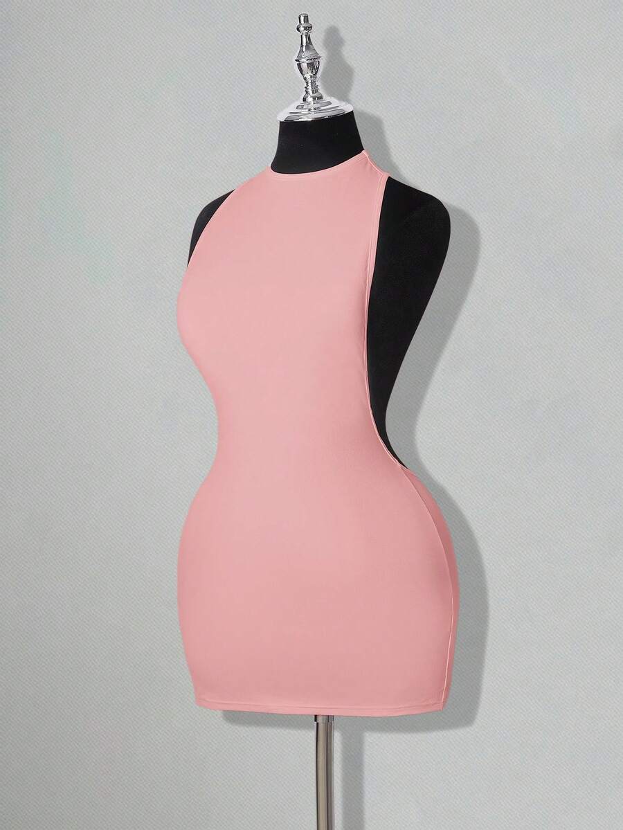 Apricot criss-cross backless bodycon mini dress for women featuring a round neck and rhinestone accent details.