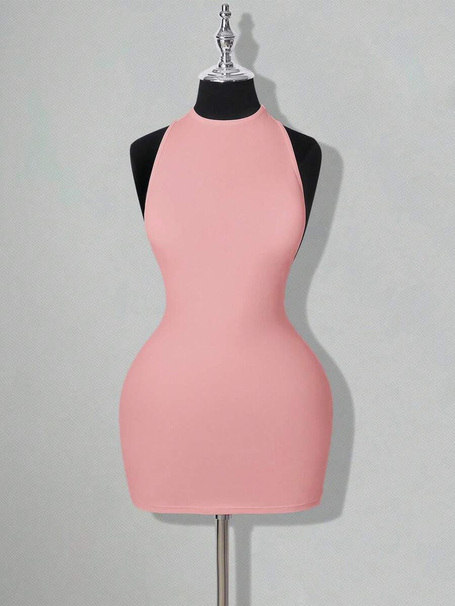 Apricot criss-cross backless bodycon mini dress for women featuring a round neck and rhinestone accent details.