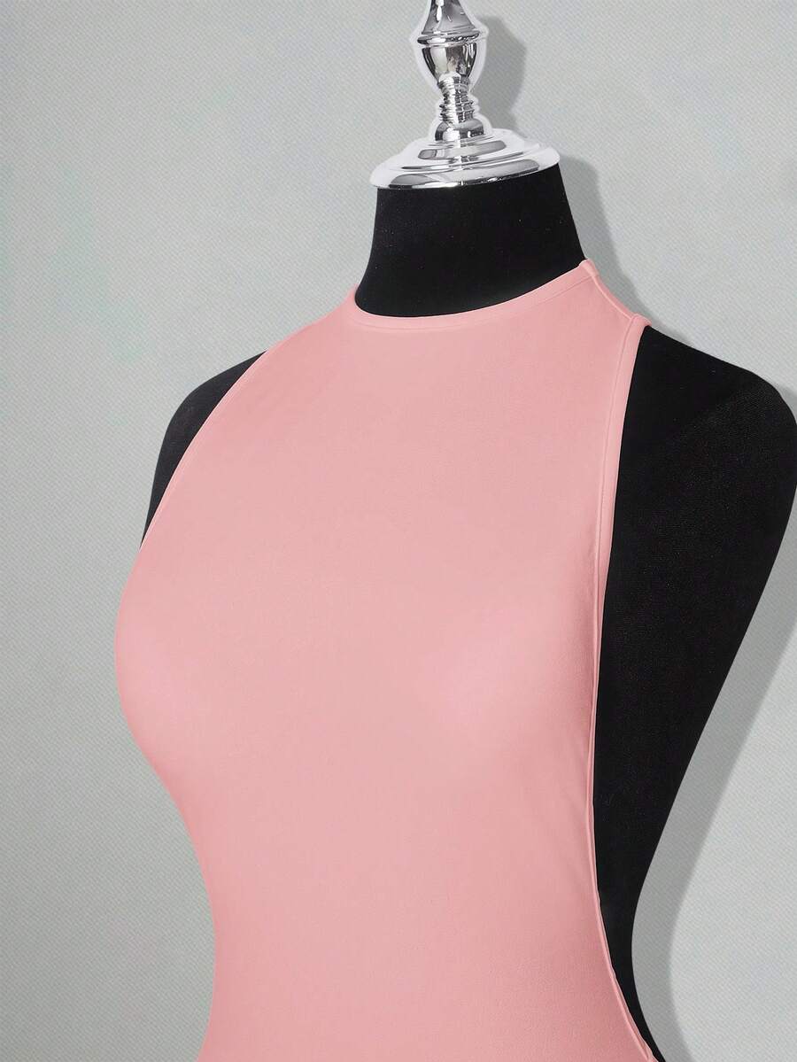 Apricot criss-cross backless bodycon mini dress for women featuring a round neck and rhinestone accent details.