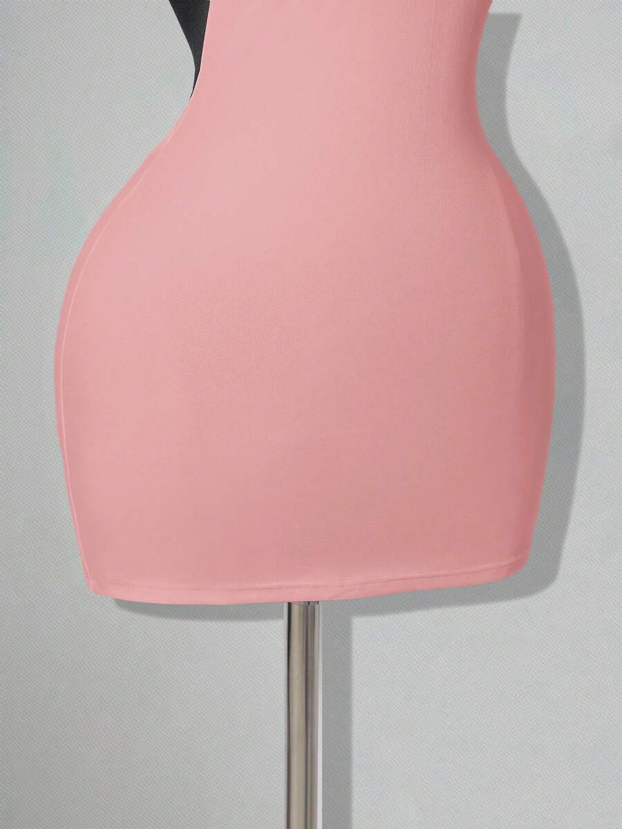 Apricot criss-cross backless bodycon mini dress for women featuring a round neck and rhinestone accent details.