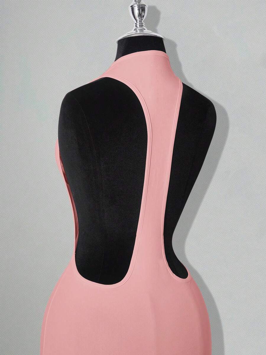 Apricot criss-cross backless bodycon mini dress for women featuring a round neck and rhinestone accent details.