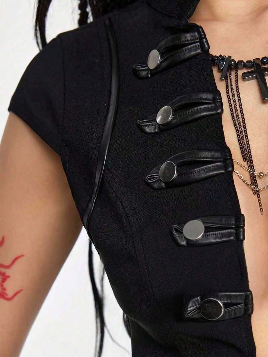 Women's black deep V-neck top featuring cap sleeves, cut-out lace-up details, zipper closure, and regular fit woven fabric.