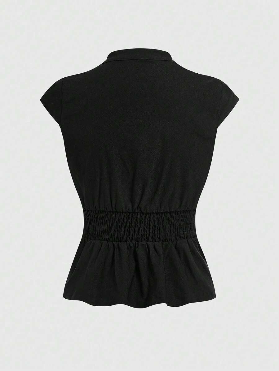 Women's black deep V-neck top featuring cap sleeves, cut-out lace-up details, zipper closure, and regular fit woven fabric.