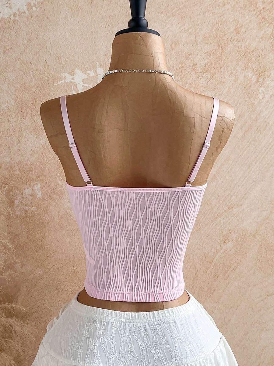 Women's black molded cup camisole top with scallop detailing and spaghetti straps.
