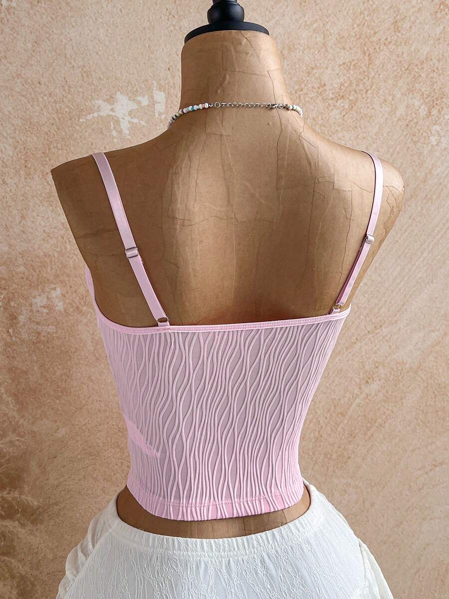 Women's black molded cup camisole top with scallop detailing and spaghetti straps.