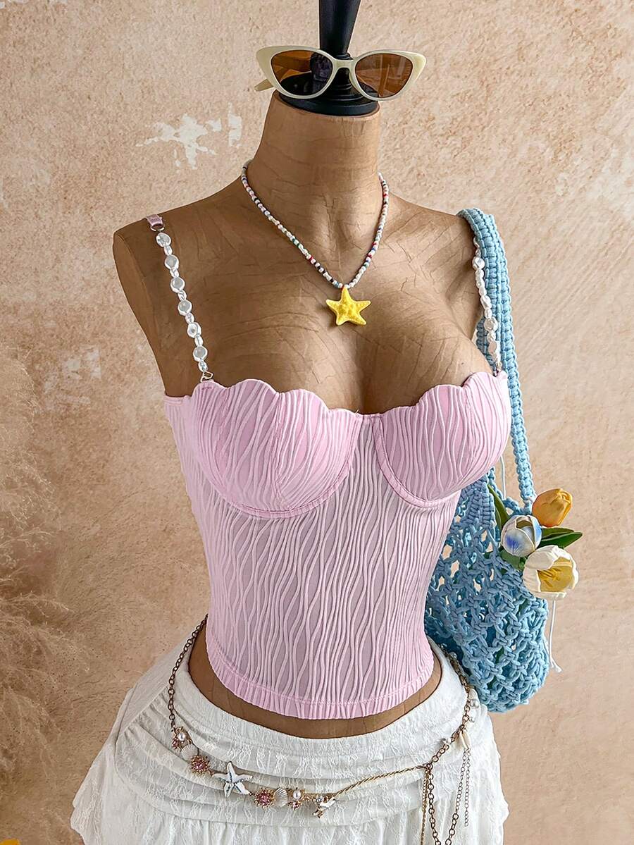 Women's black molded cup camisole top with scallop detailing and spaghetti straps.