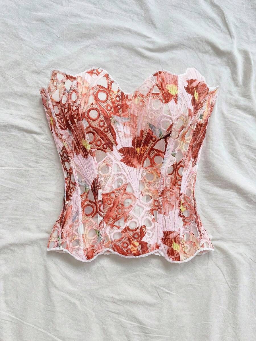 Strapless floral lace corset top with lace-up detail, asymmetrical hem, and slim fit for women.