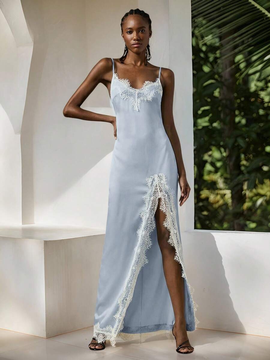 Women's black lace split satin long dress featuring spaghetti straps, asymmetrical slit hem, and matching arm sleeves.