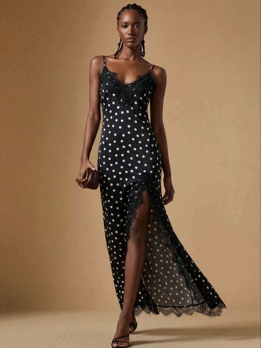 Women's black lace split satin long dress featuring spaghetti straps, asymmetrical slit hem, and matching arm sleeves.