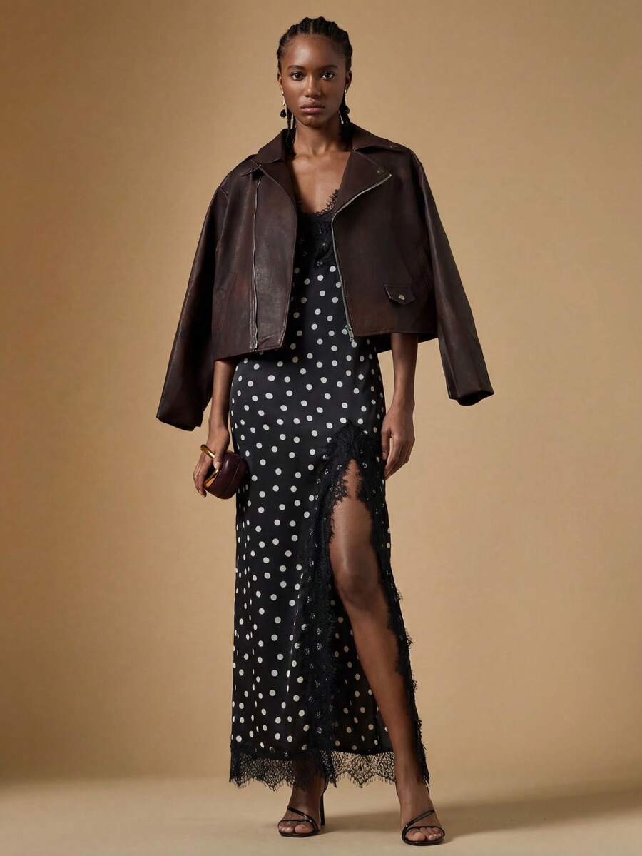 Women's black lace split satin long dress featuring spaghetti straps, asymmetrical slit hem, and matching arm sleeves.