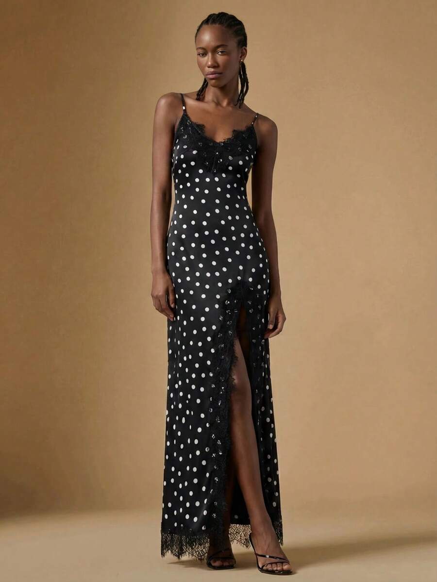 Women's black lace split satin long dress featuring spaghetti straps, asymmetrical slit hem, and matching arm sleeves.