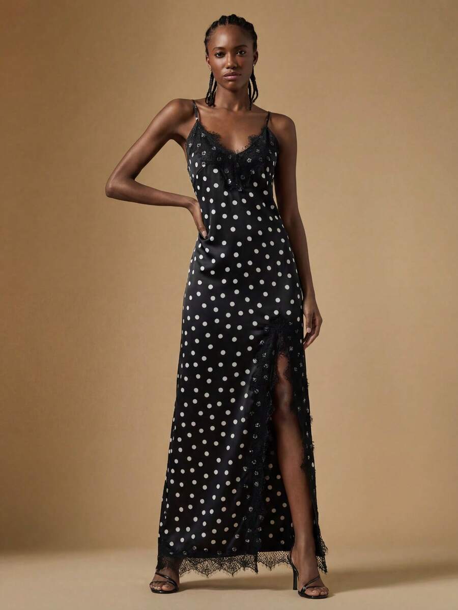 Women's black lace split satin long dress featuring spaghetti straps, asymmetrical slit hem, and matching arm sleeves.