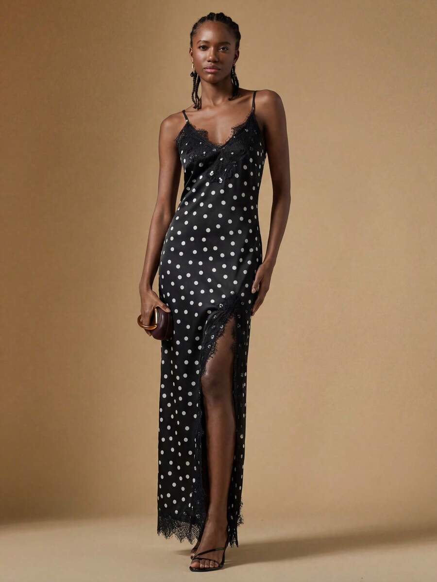 Women's black lace split satin long dress featuring spaghetti straps, asymmetrical slit hem, and matching arm sleeves.
