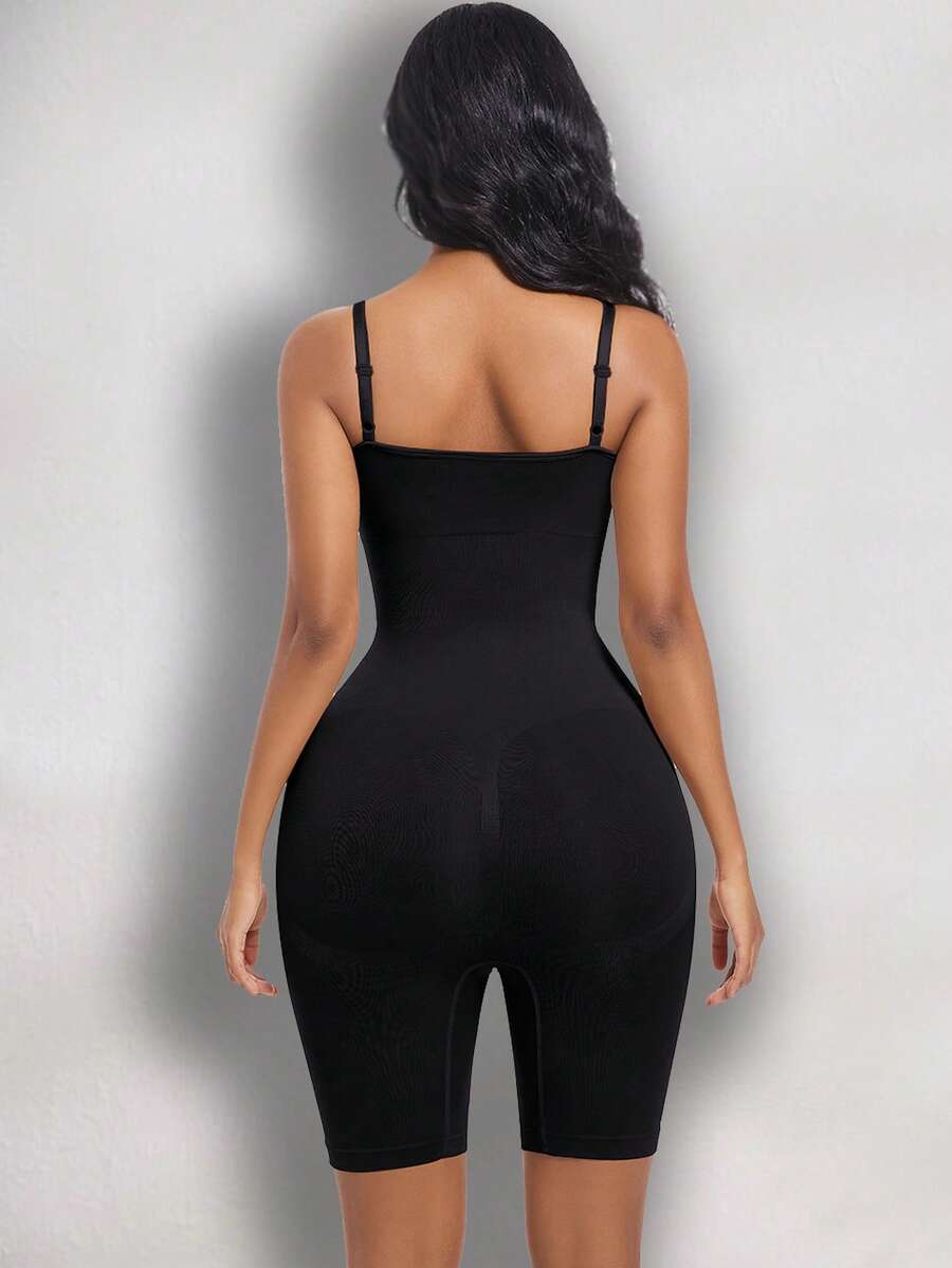 Women's black seamless shapewear jumpsuit with spaghetti straps, backless design, and strong tummy control full body shaping.