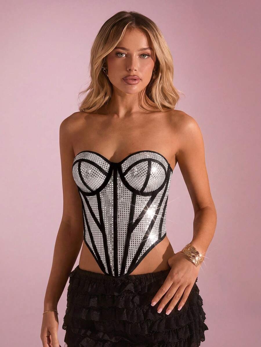 Women's metallic corset crop top in apricot featuring a sweetheart neckline, asymmetrical hem, backless cut, and matching arm sleeves.