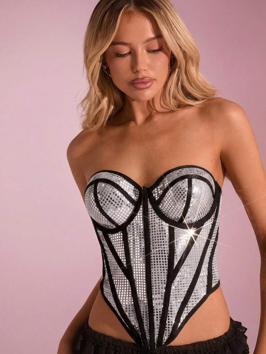Women's metallic corset crop top in apricot featuring a sweetheart neckline, asymmetrical hem, backless cut, and matching arm sleeves.
