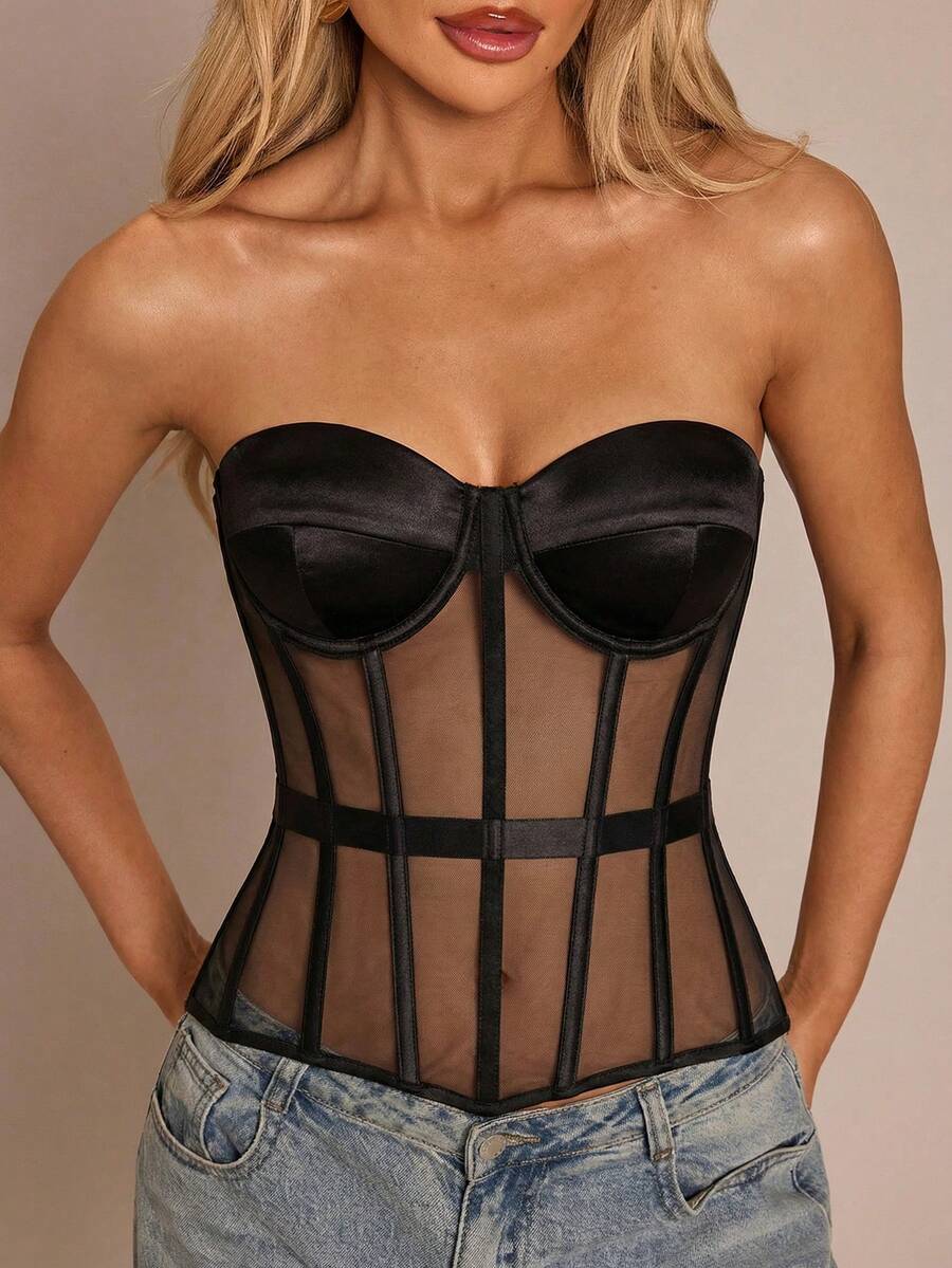 Women's black mesh patchwork bustier corset crop top with sweetheart neckline and asymmetrical hem.