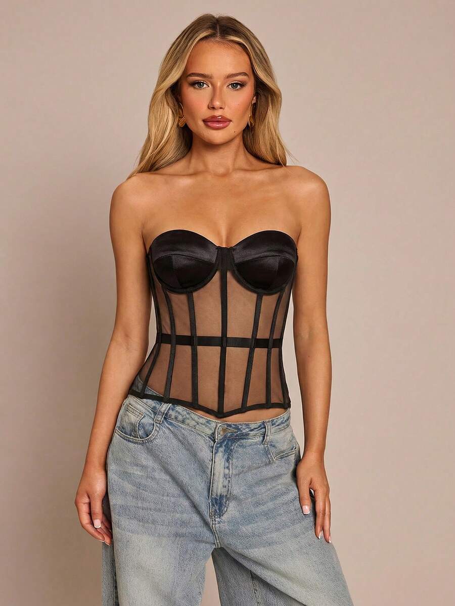 Women's black mesh patchwork bustier corset crop top with sweetheart neckline and asymmetrical hem.
