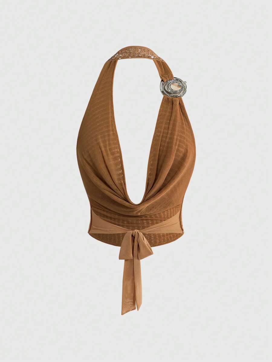 Apricot plunging halter tank top featuring a draped neck, backless tie-back knot detail, and slim micro crop fit for women.