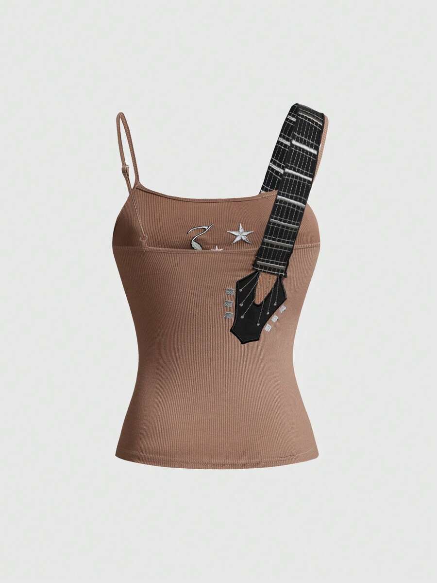 Women's bass note graphic print crop camisole top featuring lace-up detailing, spaghetti straps, and a slim fit knitted design.