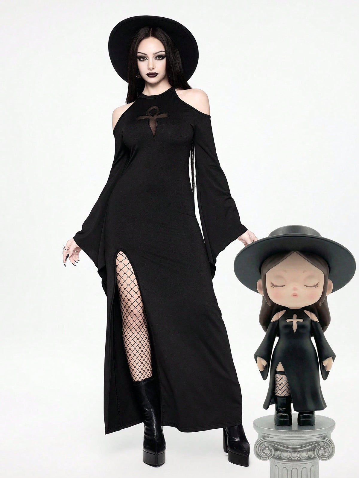 Women's black gothic long bodycon dress featuring cut out details, cold shoulder wrist-length sleeves, and a high split thigh hem.