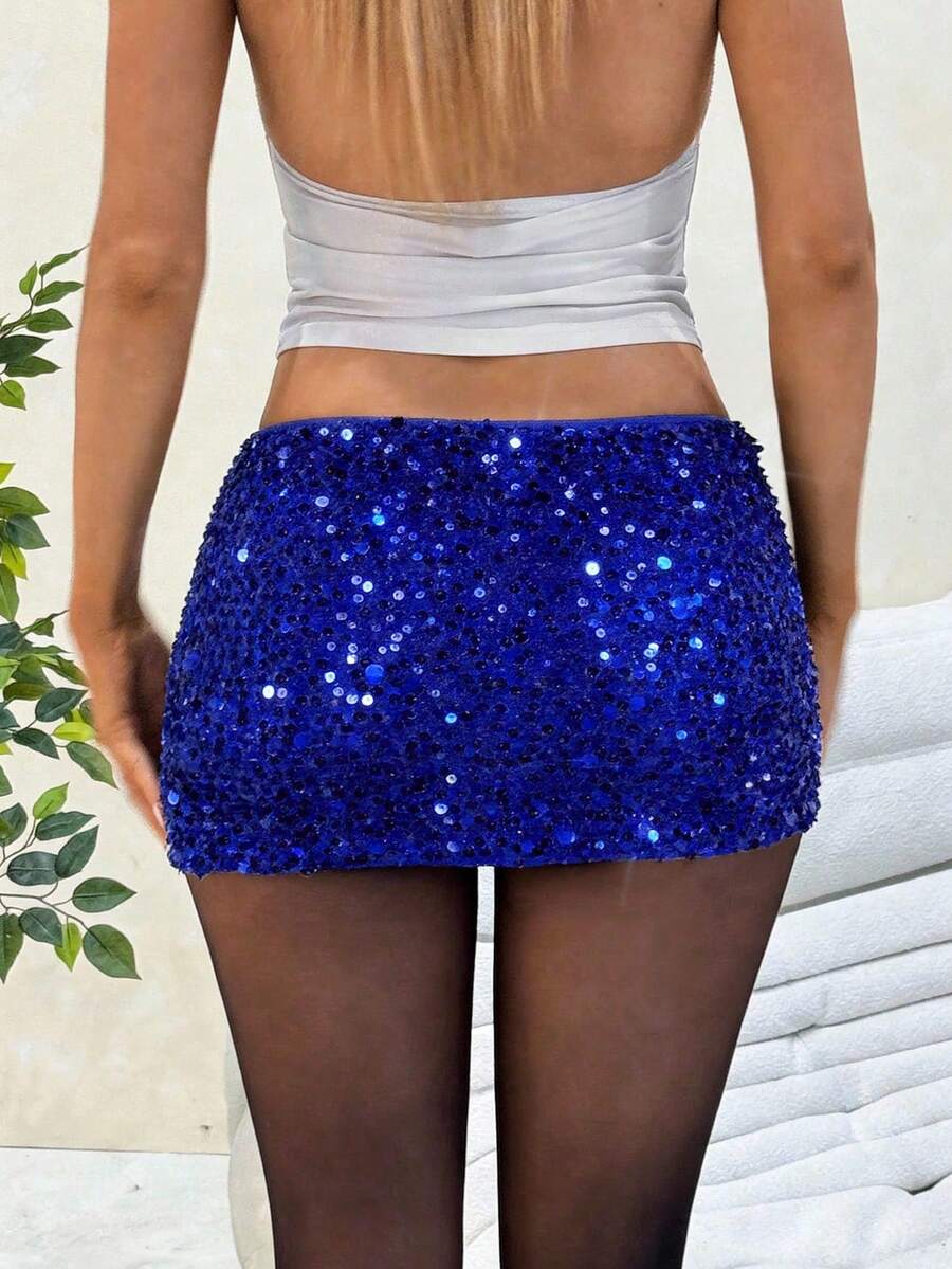 Women's black sequin bodycon mini skirt with low waist and zipper detail for party night out