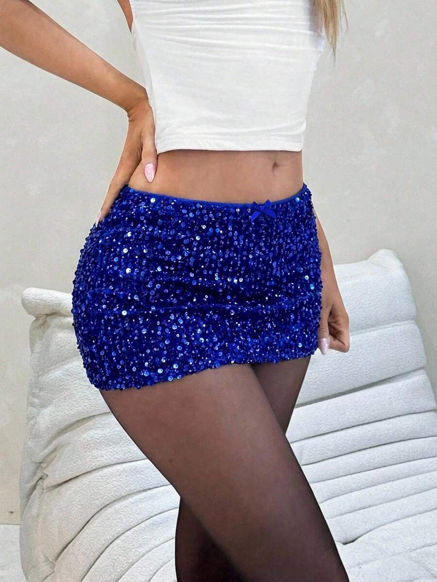 Women's black sequin bodycon mini skirt with low waist and zipper detail for party night out