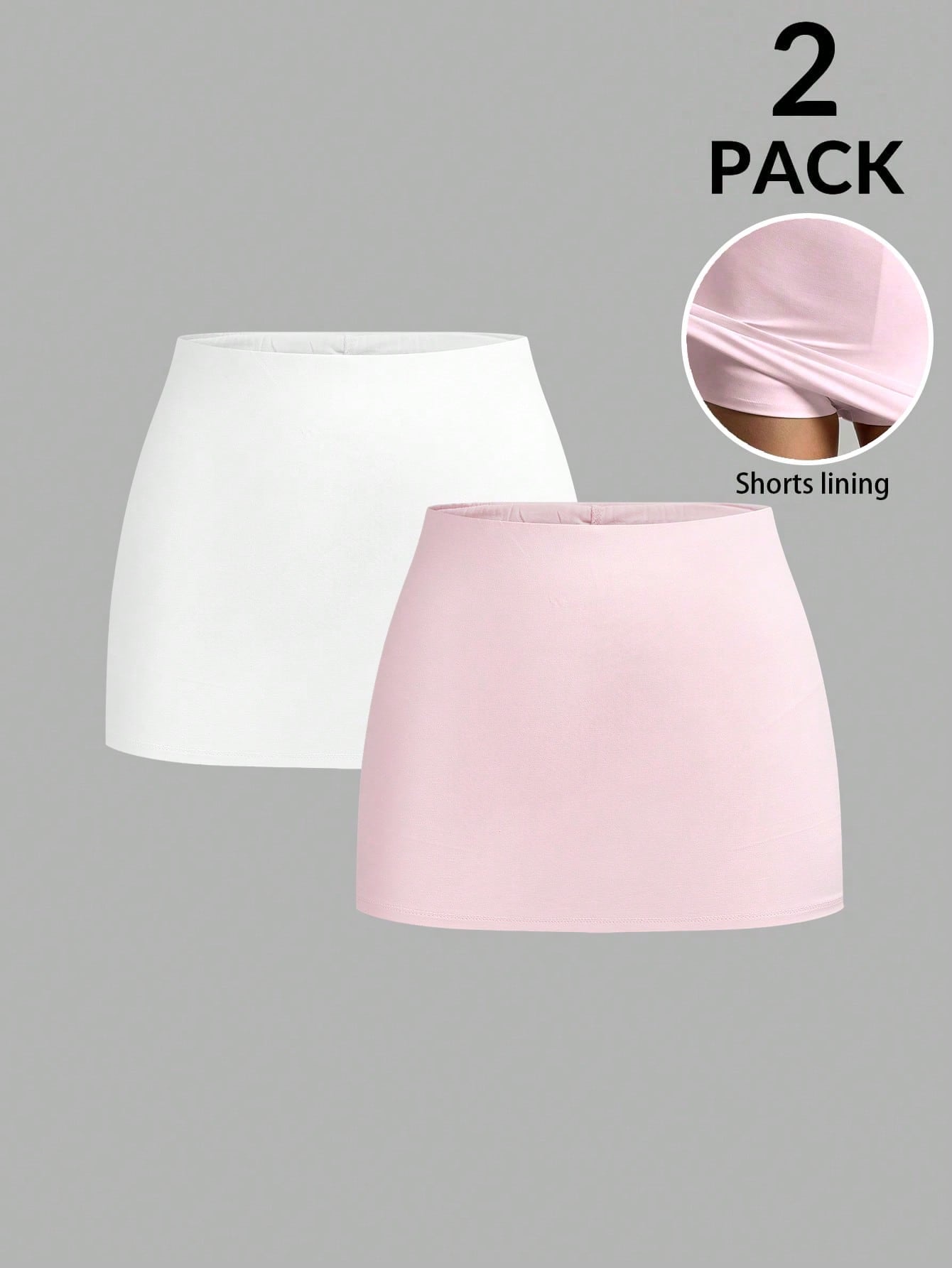Women's black casual low rise bodycon mini skort with built-in shorts in knitted plain stretch fabric.