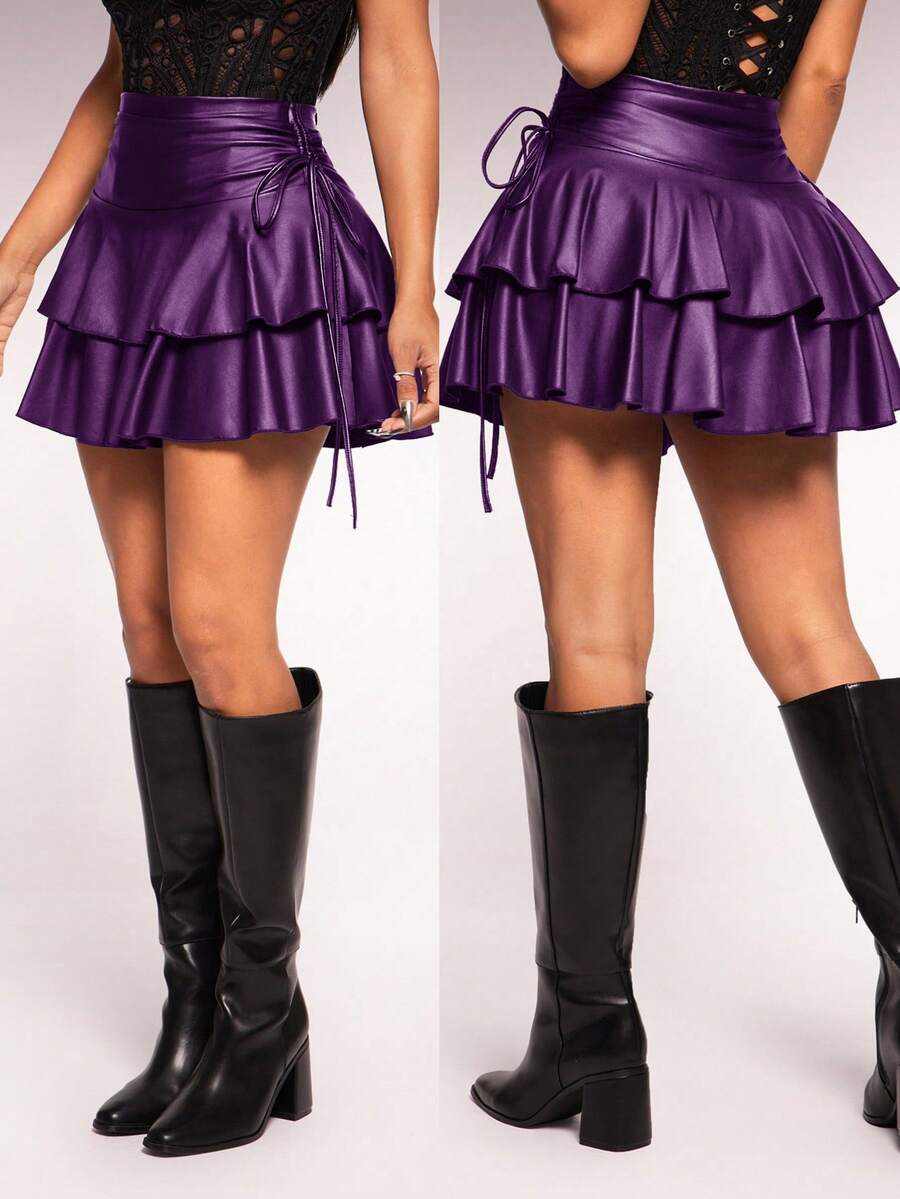 Women's black PU coated layered ruffle mini skirt featuring a high waist, tiered ruffle hem, and zipper detail.