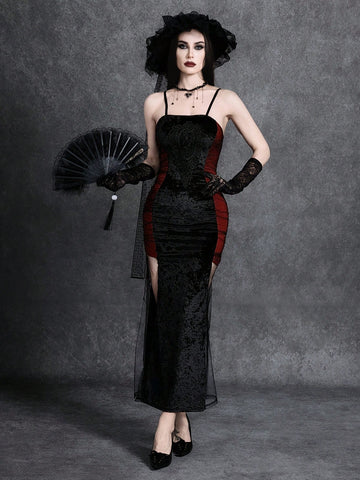 Women wearing an elegant black backless midi cami dress with slender spaghetti straps and a side split thigh hem.