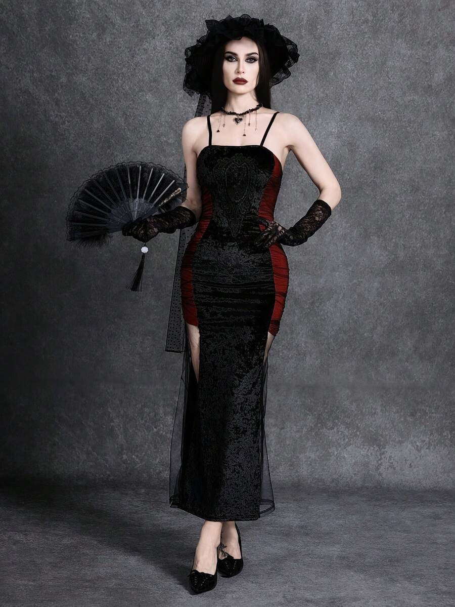 Women wearing an elegant black backless midi cami dress with slender spaghetti straps and a side split thigh hem.