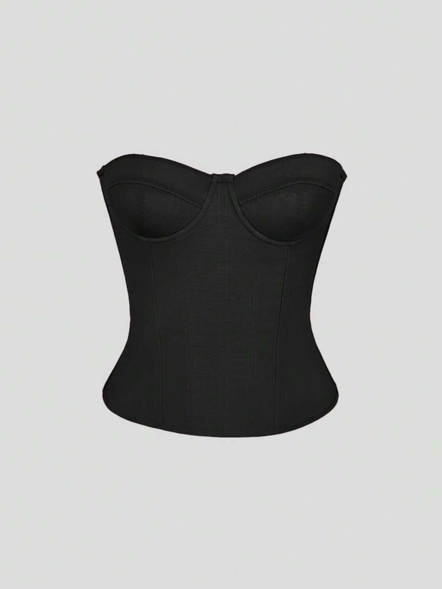Black strapless corset top with boning, lace-up back, and a cropped slim-fit silhouette for women.