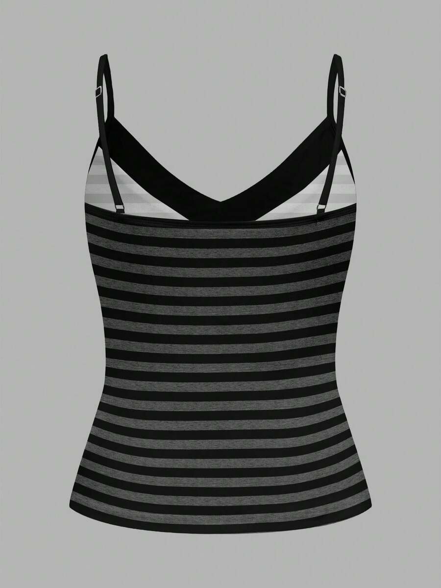 Black and white polka dot tie strap camisole top for women with thin spaghetti straps and slim fit.