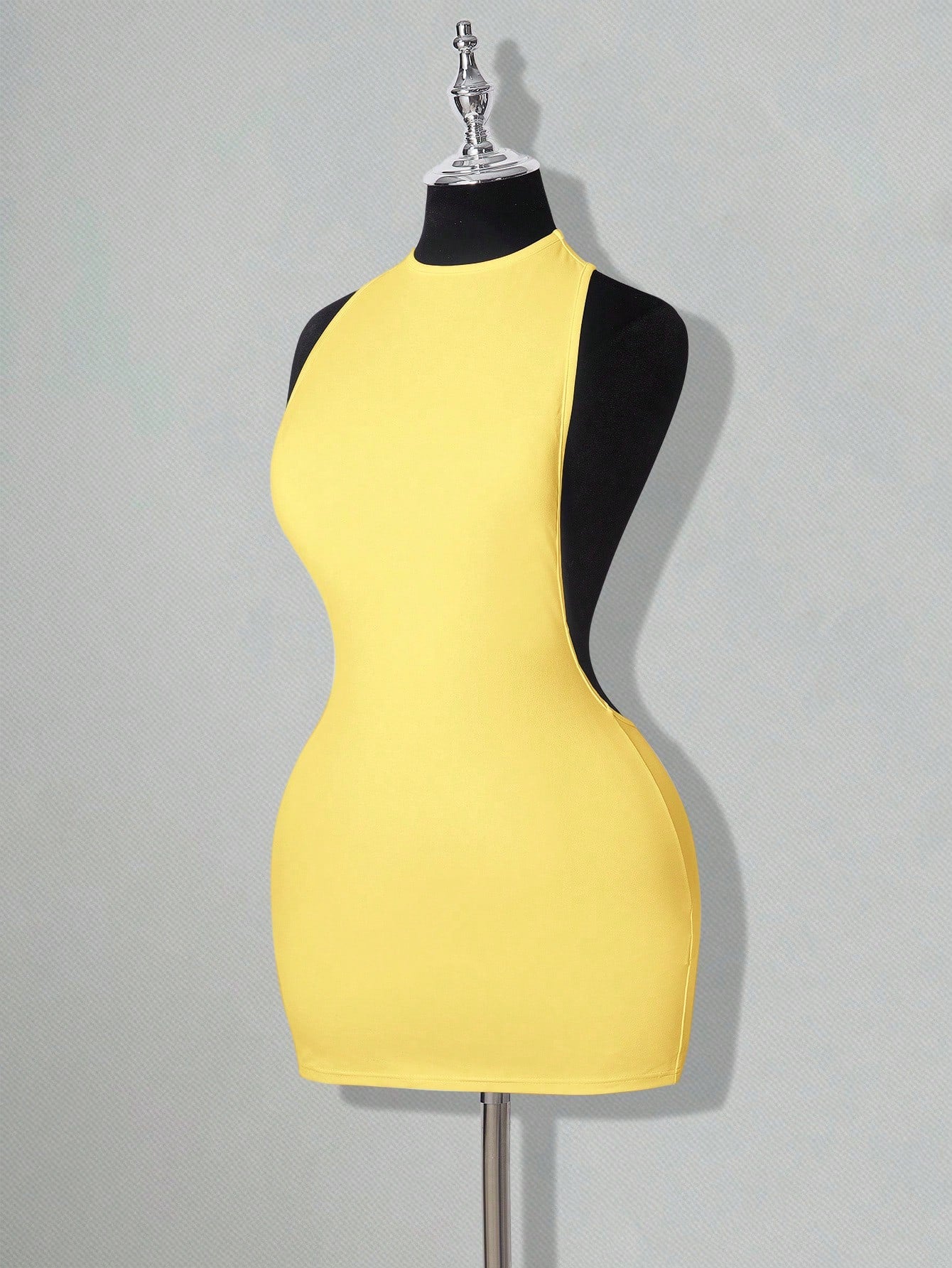 Apricot criss-cross backless bodycon mini dress for women featuring a round neck and rhinestone accent details.