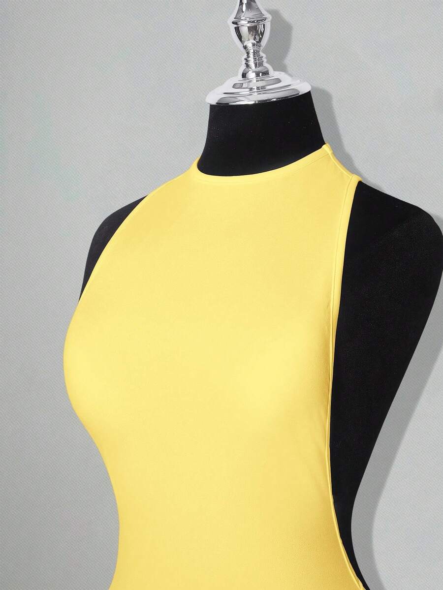 Apricot criss-cross backless bodycon mini dress for women featuring a round neck and rhinestone accent details.