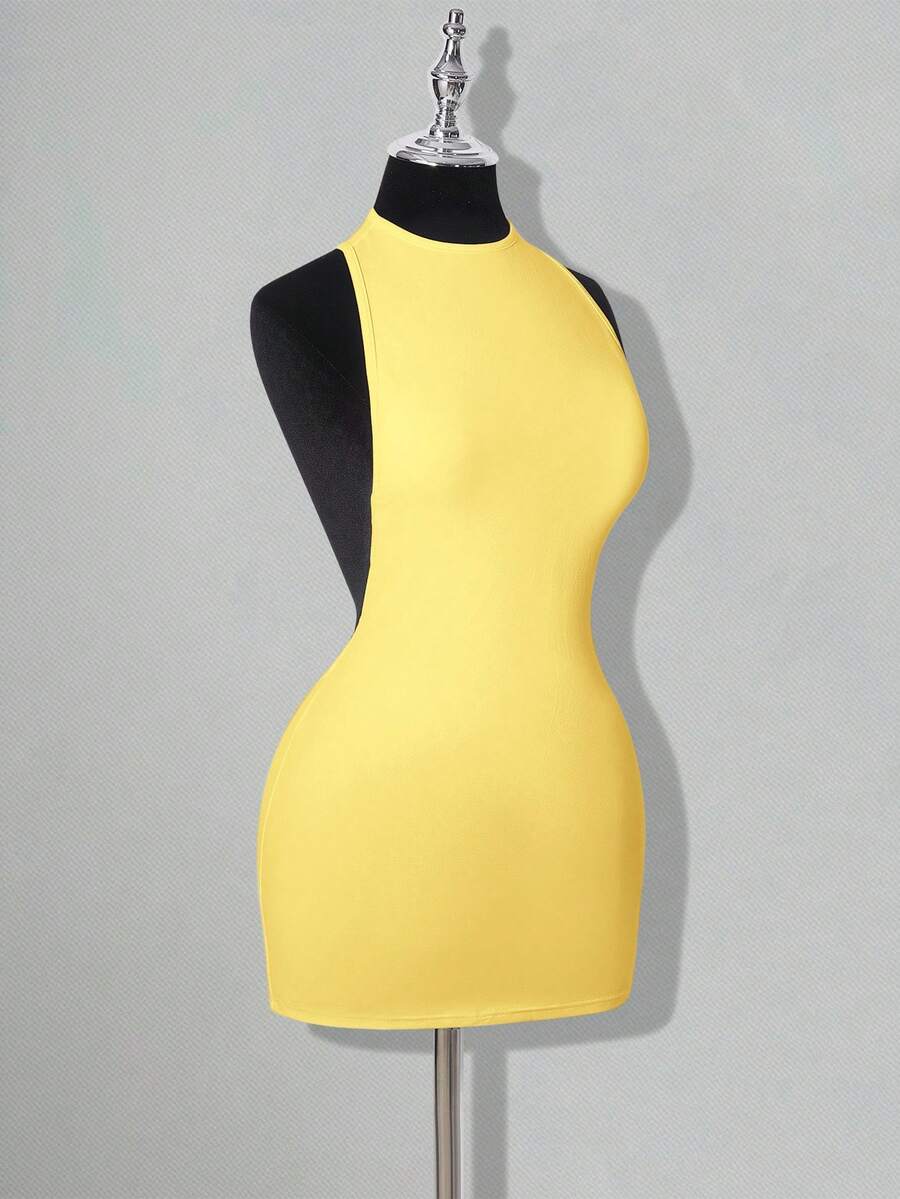 Apricot criss-cross backless bodycon mini dress for women featuring a round neck and rhinestone accent details.