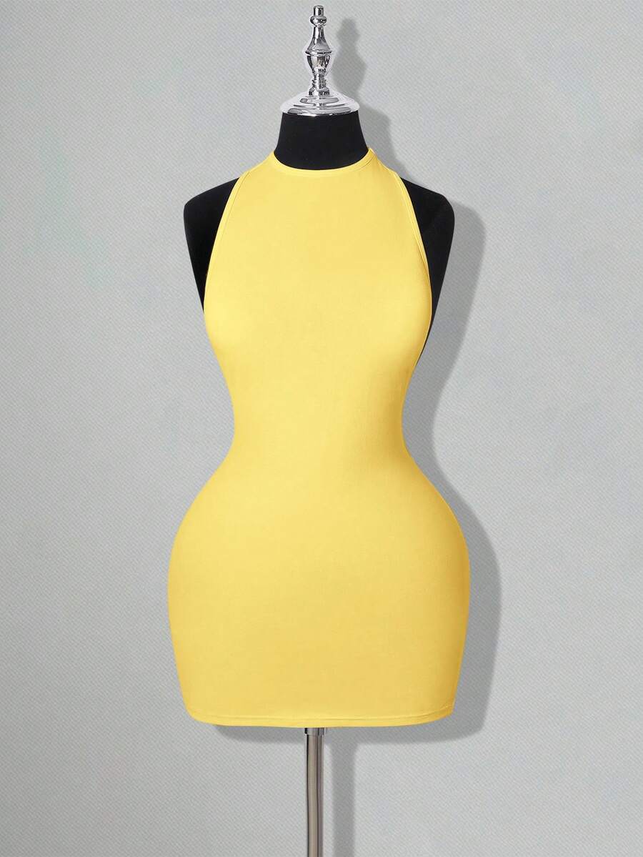 Apricot criss-cross backless bodycon mini dress for women featuring a round neck and rhinestone accent details.