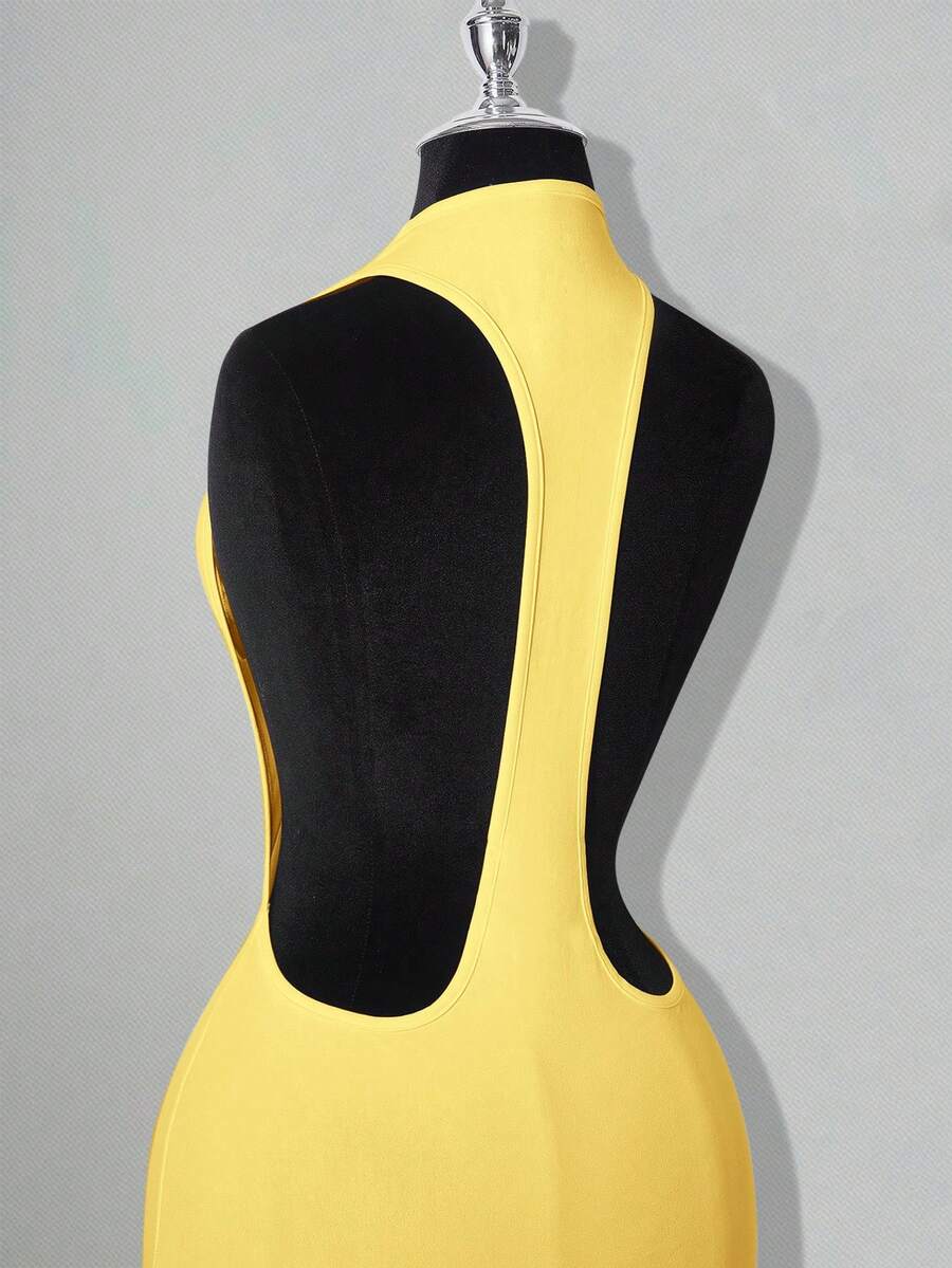 Apricot criss-cross backless bodycon mini dress for women featuring a round neck and rhinestone accent details.