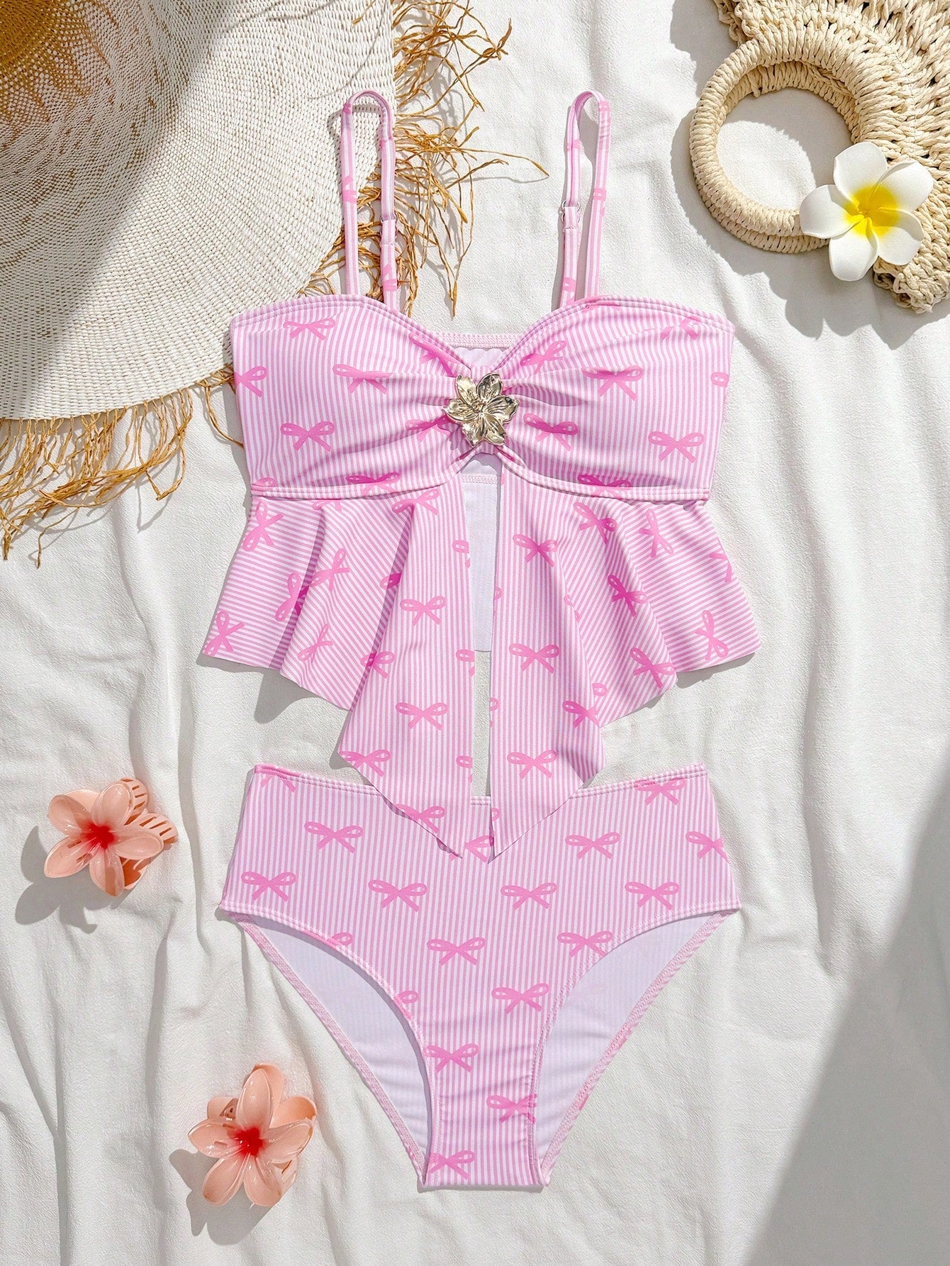 Tween girls two-piece tankini swimwear set with spaghetti straps, asymmetrical design, and 3D rose detail. Features a plant-pattern top and mid-waist bottoms in stretchy fabric for beach or pool wear.
